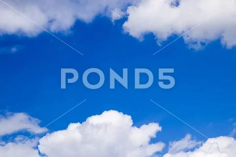Heavenly landscape with clouds. Cumulus clouds in the sky Stock Photos
