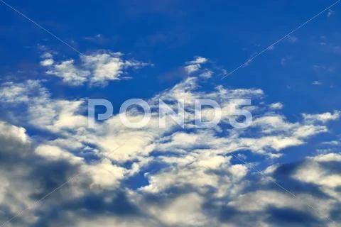 Heavenly landscape with Cumulus clouds Stock Photos
