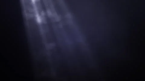 Heavenly light rays shining down, divine light beams spotlight, bright stage  Stock Footage 309113349