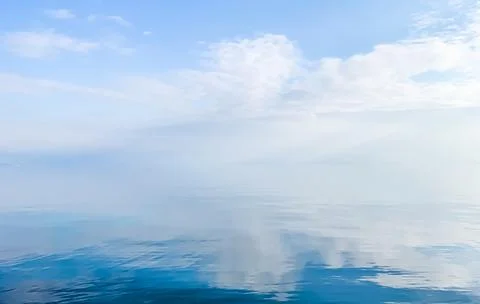 Heavens reflection on the sea Stock Photos