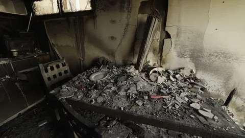 A Heavily Damaged Burned House Interior After Fire Stock Footage