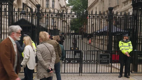 Heavily guarded gate at Downing St, home to the Prime Minister. London, England. Stock Footage 201475698