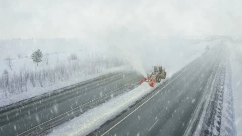 Heavy big storm snow fall, grader clean remove snow, snowplow, snow blower Stock Footage 85684483