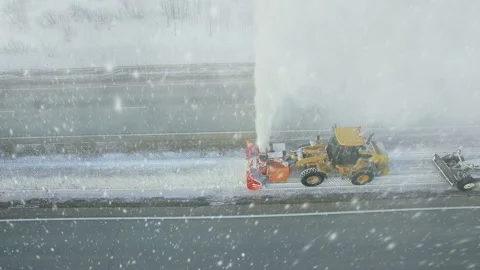 Heavy big storm snow fall, grader clean remove snow, snowplow, snow blower Stock Footage 85684760