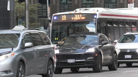 Heavy car traffic jam and gridlock congestion on Toronto streets Stock Footage 163488078