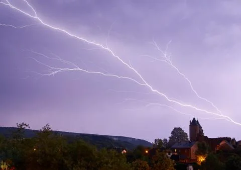 Heavy clouds bringing thunder, lightnings and storm. Stock Photos