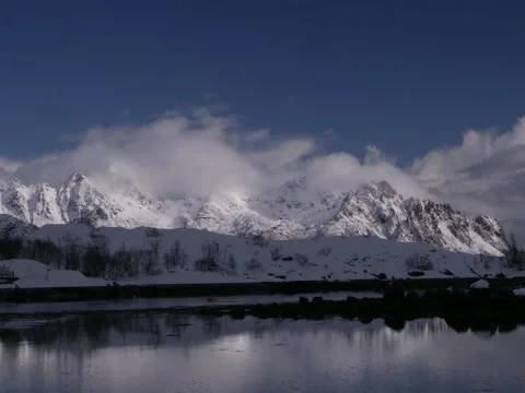Heavy clouds coming over snowy mountains in Norway, timelapse, sky, clouds Stock Footage 205862005