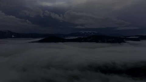 Heavy clouds drifting over remote highlands Video stock 328494269