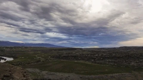 Heavy clouds move past as the day ends timelapse Stock Footage 107693176