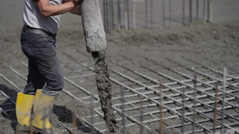 Heavy Construction Concrete Poured down Stock Footage 241729983