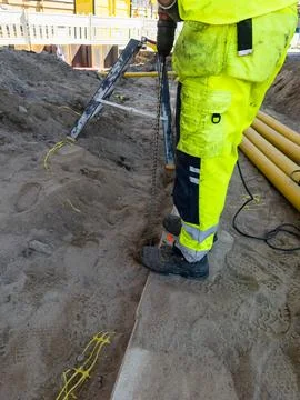 Heavy construction work during summer infrastructure development Stock Photos
