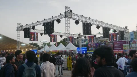 Heavy crowd with truss lighting, led screens on Grand Sataabdi Utsav event at Stock Footage 342892213