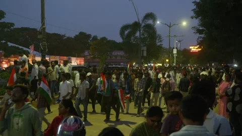 Heavy crowd to watch protest rally with Telangana Fireworks Grand Sataabdi Stock Footage 342031253