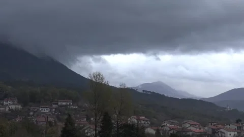 Heavy dark clouds moving fast incoming rain Stock Footage 158761069