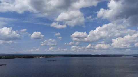 Heavy daytime navigable traffic on the river 4K Stock Footage 156913638