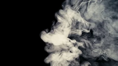 Heavy dense smoke in slow motion on a dark background. Stock Footage 82682357