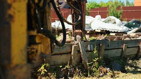 Heavy drilling machine creating deep well foundation Stock Photos