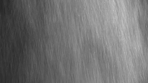 Heavy droplets of rain falling on an isolated background Stock Footage 126139614