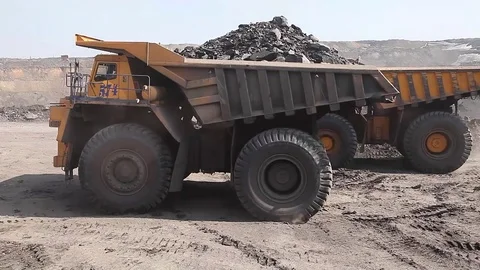 Heavy dump truck is driving backwards  Stock Footage 83502641