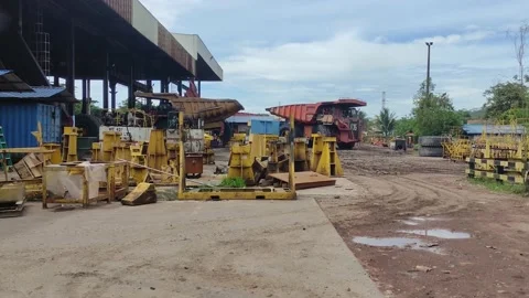 A Heavy dump truck goes into the workshop. Workshop for repair mining dump truck Stock-Footage 221838906