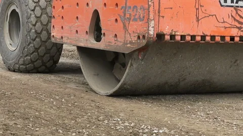 Heavy duty machine leveling ground Stock Footage 67985680