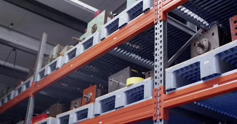 Heavy Duty Pallet Racking With Blue Crates And Stored Tooling, Low Angle Shot Stock Footage 340665778