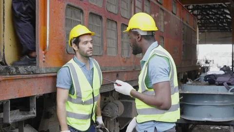 The heavy duty technicians working in the train garage  스톡 동영상 237297378
