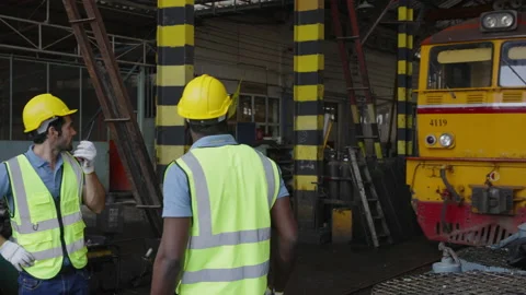 The heavy duty technicians working in the train garage  스톡 동영상 237297406