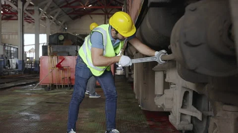 The heavy duty technicians working in the train garage  스톡 동영상 237298081