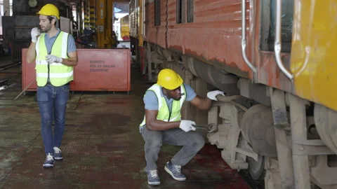 The heavy duty technicians working in the train garage  스톡 동영상 237298289