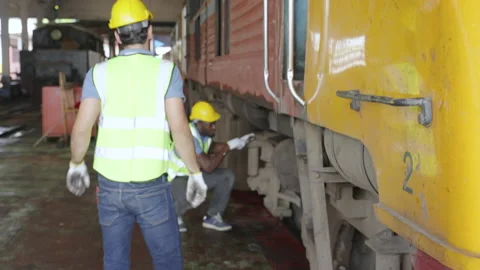 The heavy duty technicians working in the train garage  스톡 동영상 237298369