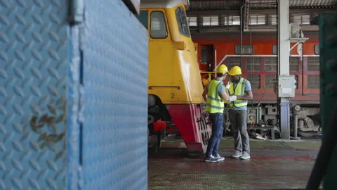 The heavy duty technicians working in the train garage  스톡 동영상 237299361