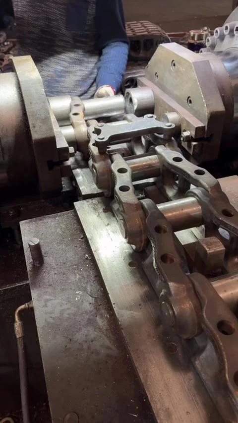 Heavy Duty Track Link Assembly Process in Machinery Factory. Stock Footage 330379588