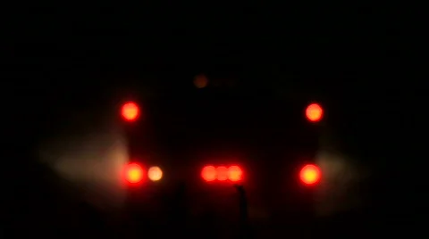 Heavy Duty Truck Drives Away at Night Stock Footage