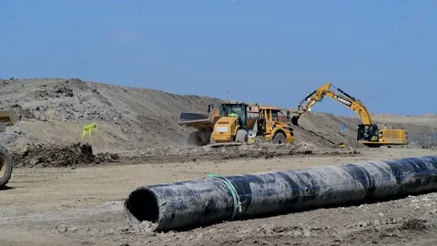 Heavy earth moving machinery construction on the new east leeds orbital road uk Stock Footage 211662998