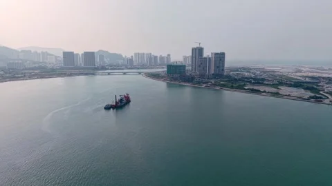 Heavy Engineering Workboat Barge on Urban Waterfront Vídeos de archivo 345835508