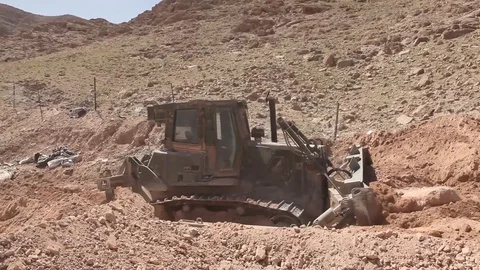 Heavy equipment operating at Forward Operating Base Whitehouse - 2012 Stock Footage 104299039