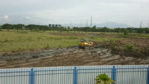 Heavy Equipment Work, Land Development For New Factory, Bulldozer Operator Video stock 171926047