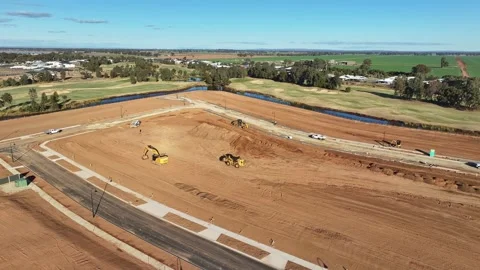 Heavy equipment working on a construction site within a golf course Stock Footage 278340272