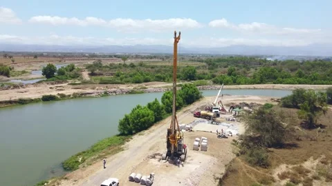 Heavy equipment working on vertical deep well drilling Stock Footage 310802906