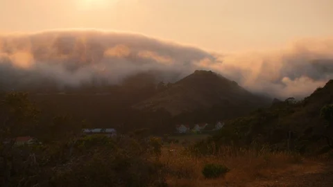 A heavy evening mist rolls over the Marin Headlands towards Fort Baker Video stock 94084937