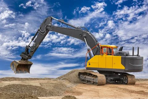 Heavy excavator working on construction site Stock Photos