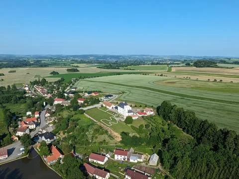 Heavy excavators and dump trucks working on new city bypass construction near Stock Photos