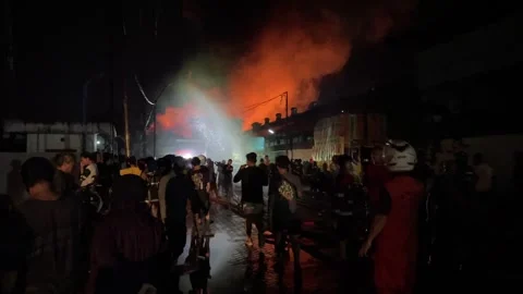 Heavy fire in plastic storage warehouse Stock Footage 290944273