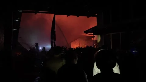 Heavy fire in plastic storage warehouse Stock Footage 290944280