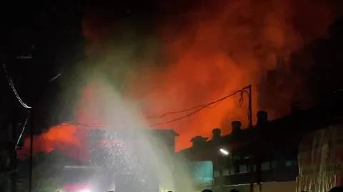 Heavy fire in plastic storage warehouse Stock Footage 290944412