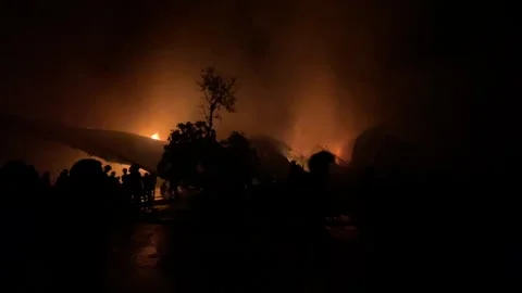 Heavy fire in plastic storage warehouse Stock Footage 290944514