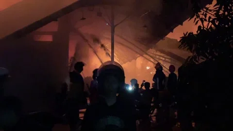 Heavy fire in plastic storage warehouse Stock Footage 290944635