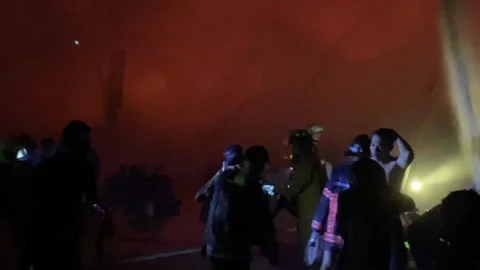 Heavy fire in plastic storage warehouse Stock Footage 290944994