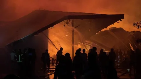 Heavy fire in plastic storage warehouse Stock Footage 290945008
